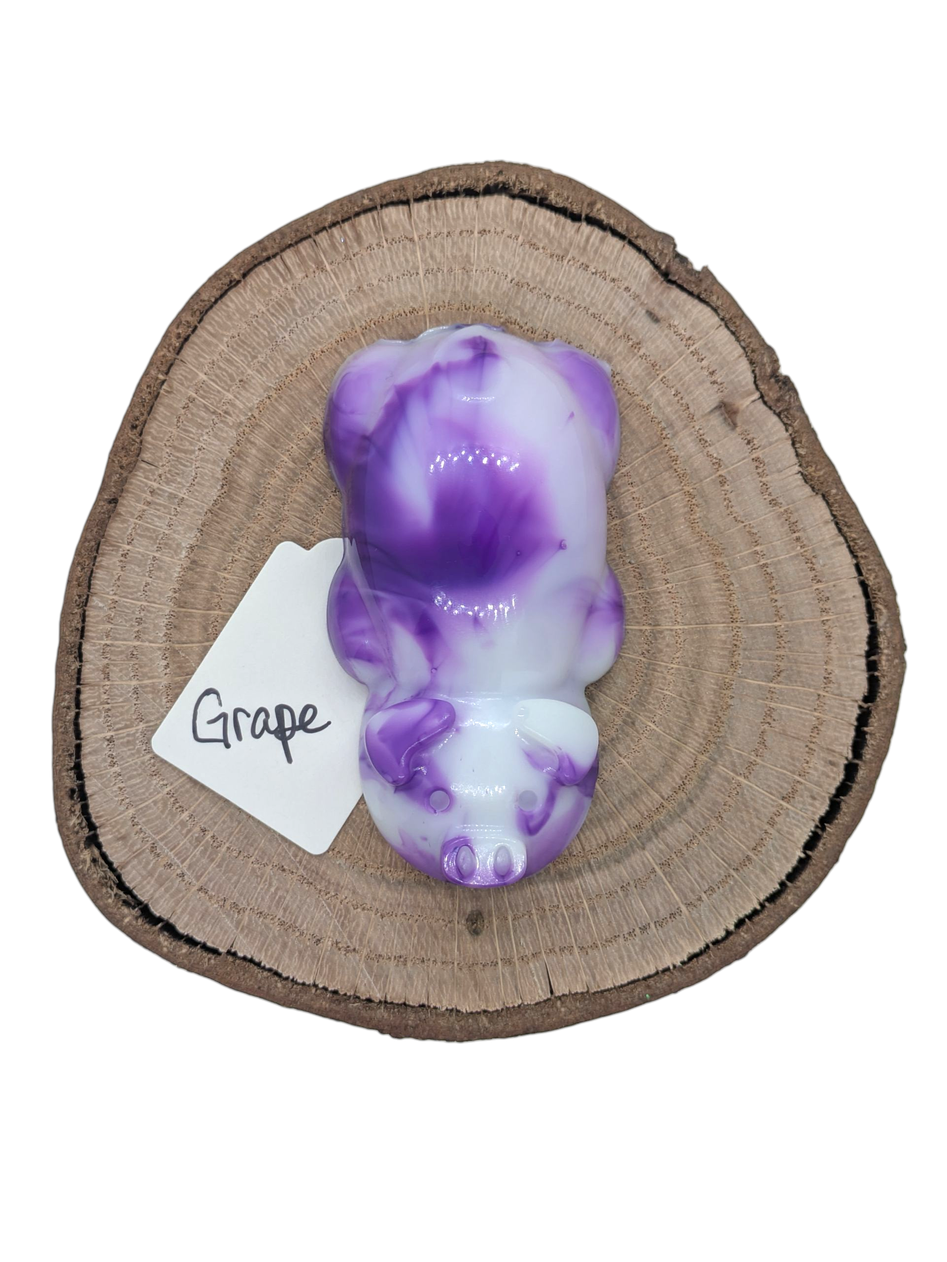 Resin pig figure in grape color