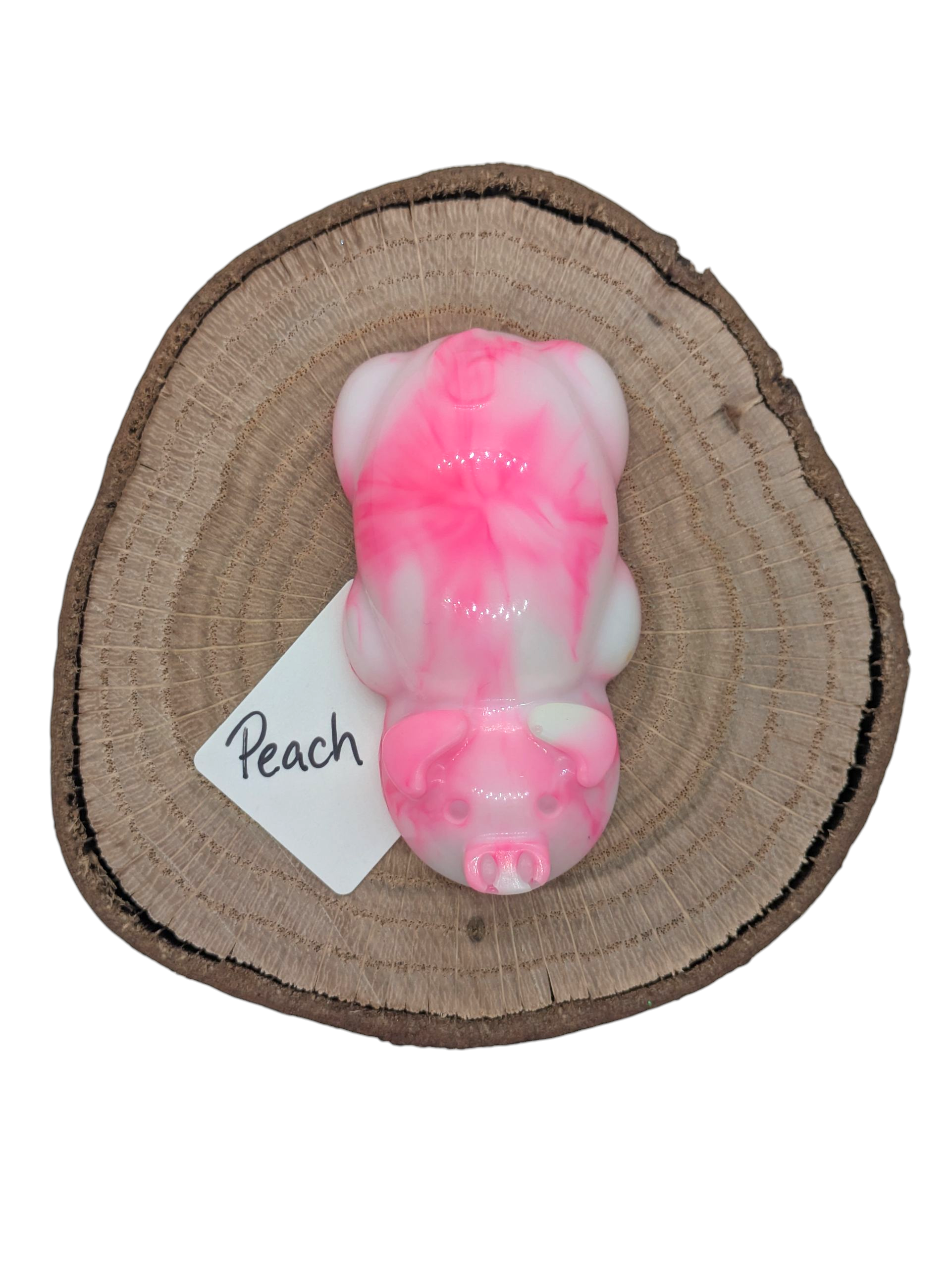 Resin pig figure in peach color