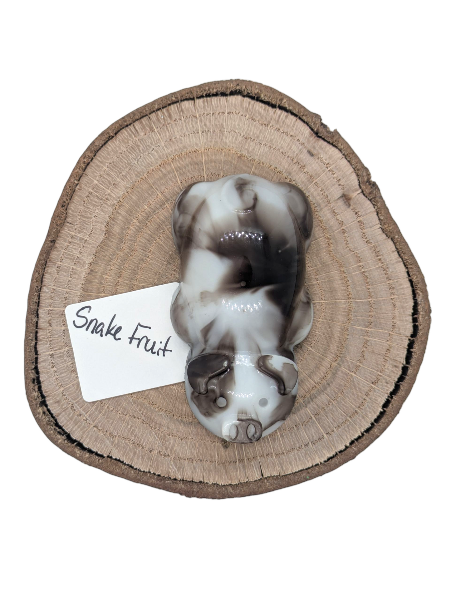 Resin pig figure in Snake Fruit color
