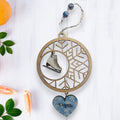 Figure Skating Wooden Snowflake Ornament with hanging figure skate and 'Dream' heart